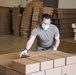 Kansas Army National Guard Soldiers prepare hunger relief boxes for Wichita Food Bank