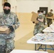 Kansas Army National Guard Soldiers prepare hunger relief boxes for Wichita Food Bank