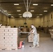 Kansas Army National Guard Soldiers prepare hunger relief boxes for Wichita Food Bank