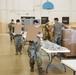 Kansas Army National Guard Soldiers prepare hunger relief boxes for Wichita Food Bank