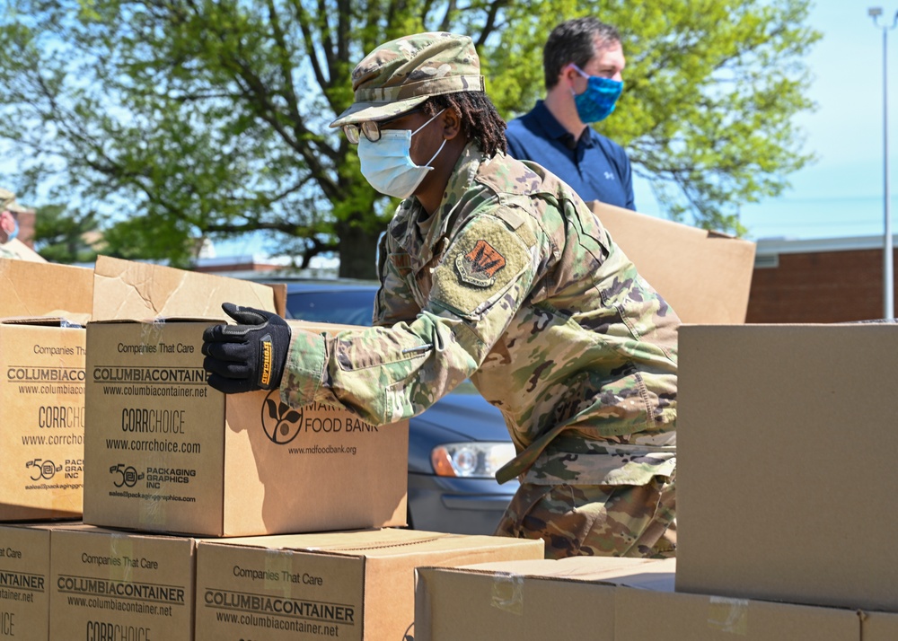 Maryland Air National Guard and Baltimore County Executive Pass Out Groceries in the Community