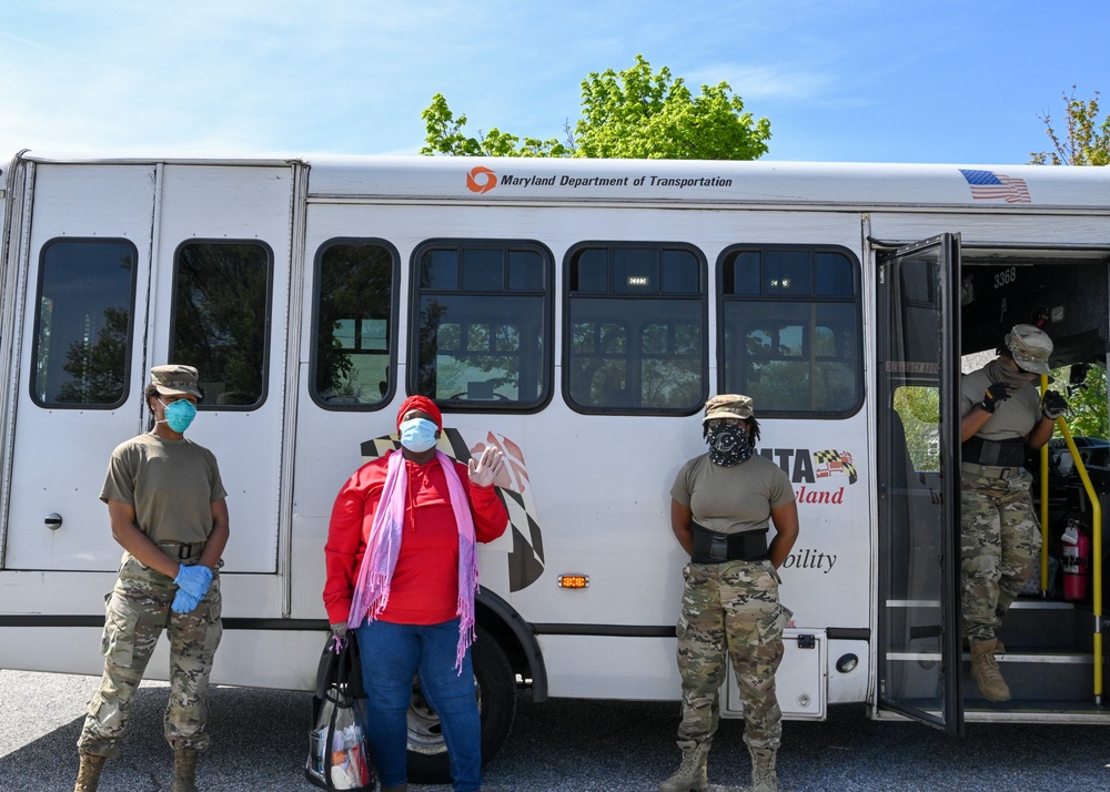 Maryland Airmen and Baltimore County Executive Pass Out Groceries in the Community