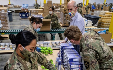 U.S. Reps visit WA Guardsmen supporting food banks