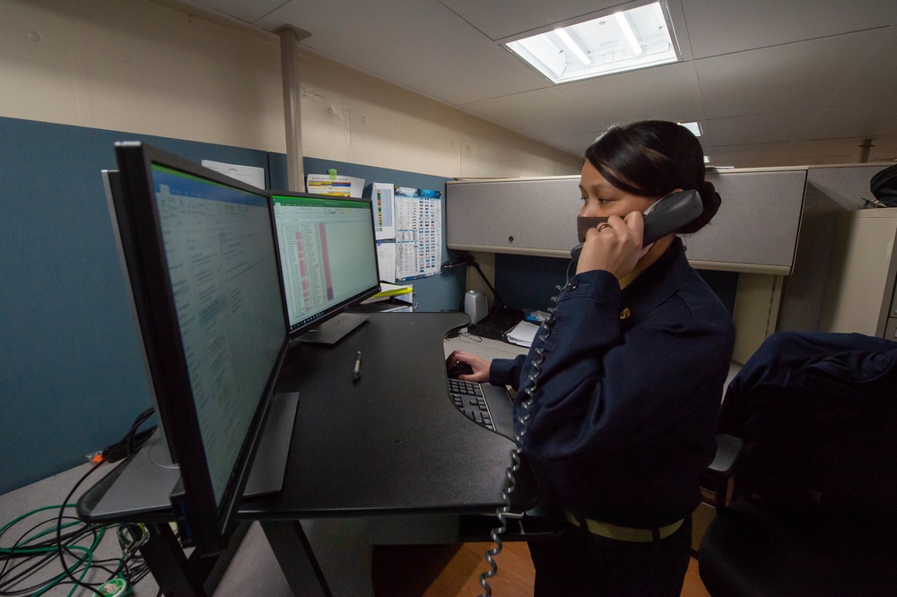 USNS Mercy Sailor Answers Phone