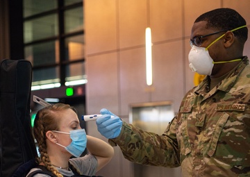 62nd APS Airmen conduct new COVID-19 screening at SeaTac