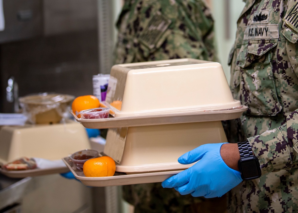 USNS Mercy Sailors Transport Patient Food