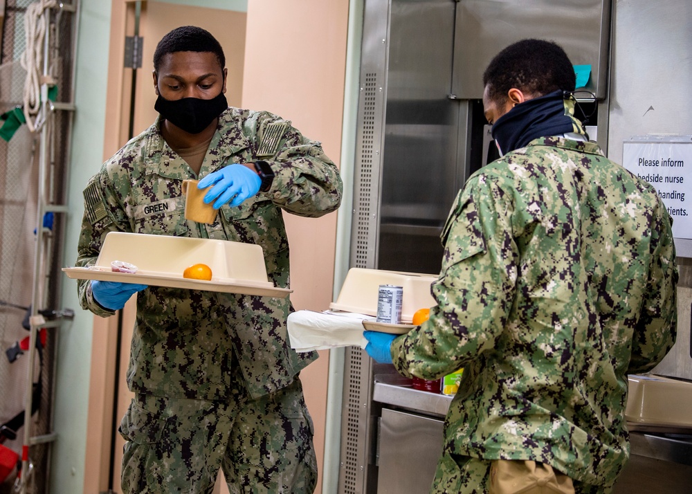 USNS Mercy Sailors Transport Patient Food