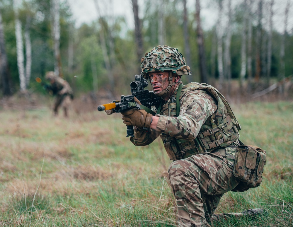 US and British Soldiers conduct recon exercise during eFP NATO BG-P