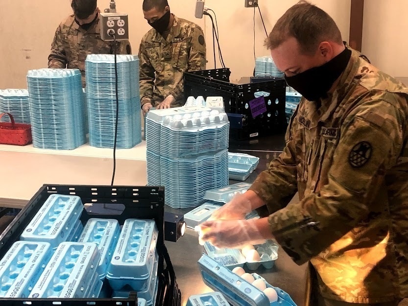 North Carolina Guardsmen &quot;Candle&quot; thousands of eggs helping impacted families of COVID-19