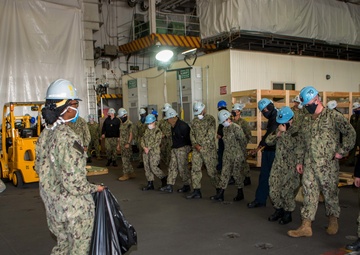USS Carl Vinson (CVN 70) Sailors Participate In FOD Walkdown