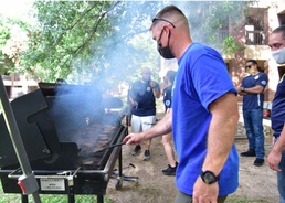 First Four Hosts Morale Cookout for Dorm Residents