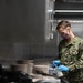 USNS Mercy Sailor Organizes Silverware
