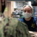 USNS Mercy Sailor Receives Dirty Meal Tray