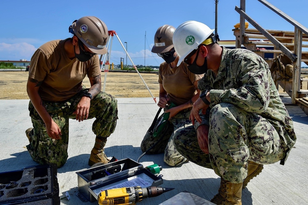 U.S. Navy Seabees with NMCB-5 construct support facilities for Marine Air Control Squadron 4
