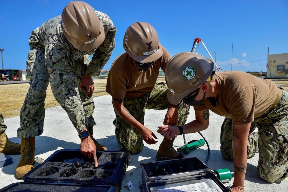 U.S. Navy Seabees with NMCB-5 construct support facilities for Marine Air Control Squadron 4