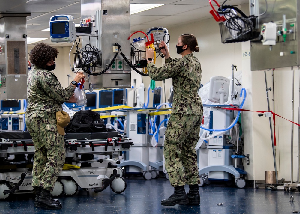 USNS Mercy Sailors Remove Medical Attachments