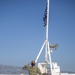 USNS Mercy Sailor Renders Hand Salute