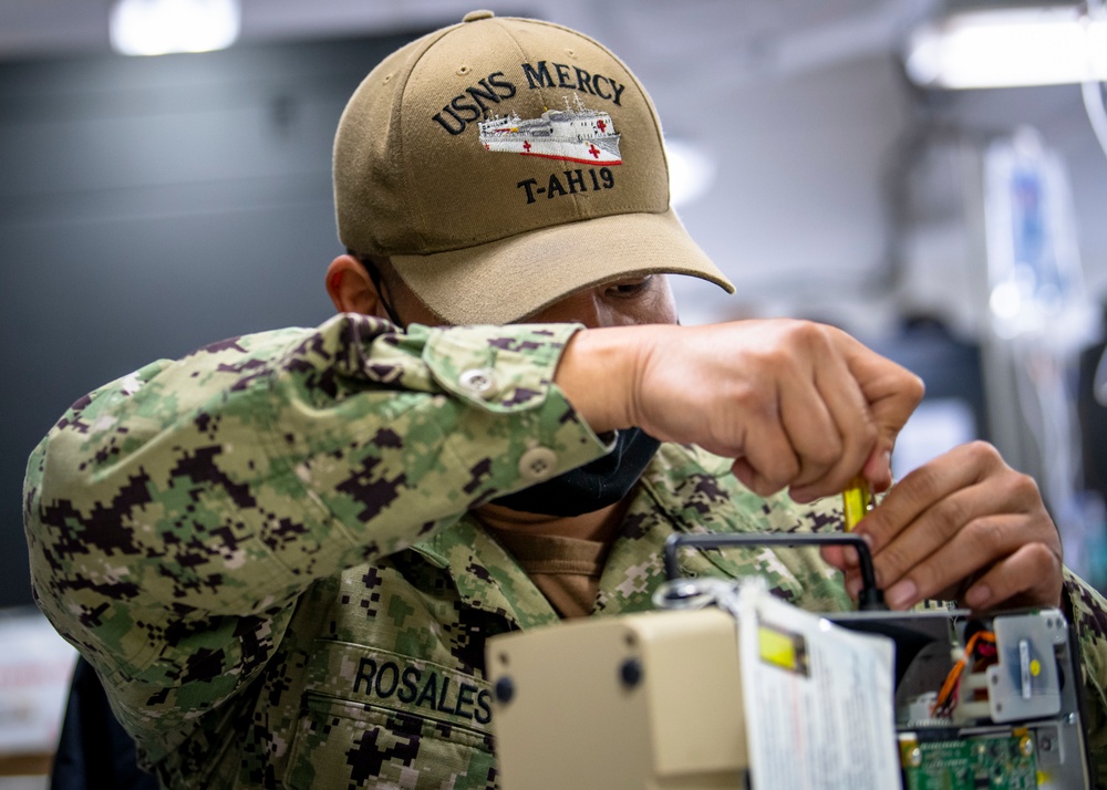 USNS Mercy Sailor Works in Bio Med