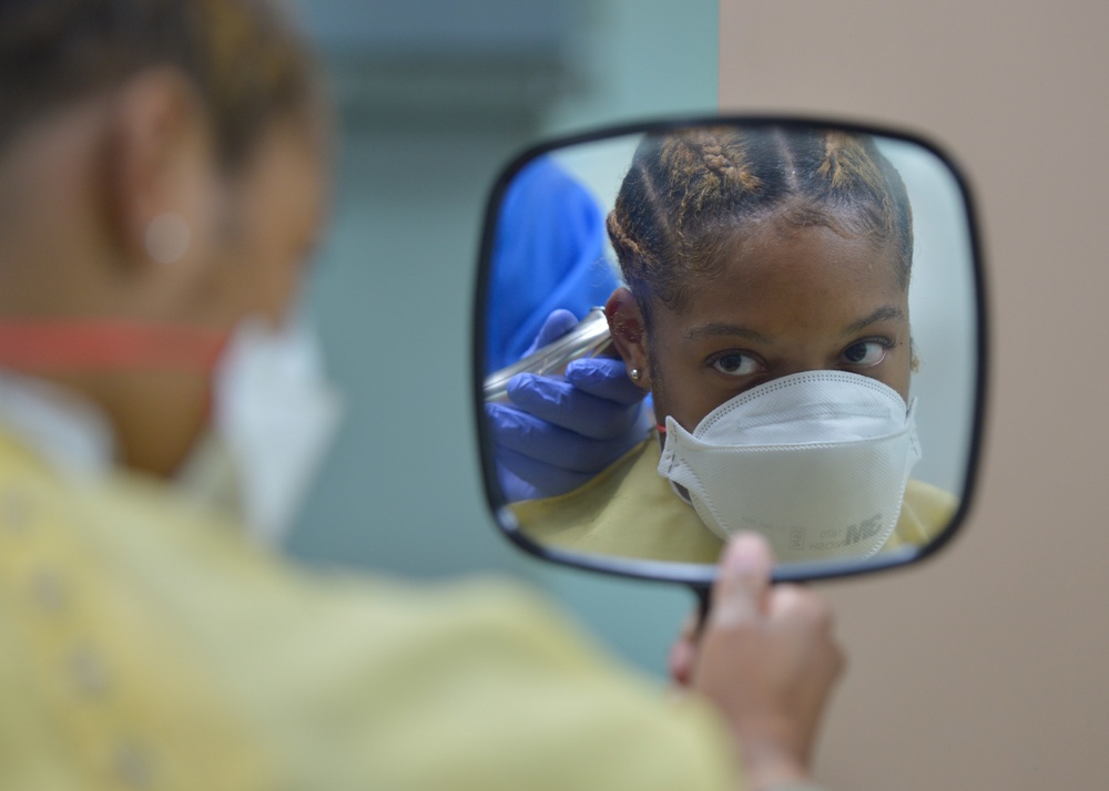 USNS Mercy Sailor Receives Haircut