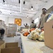 Airmen and Soldiers from the New Mexico National Guard Joint Task Force package food in response to COVID-19