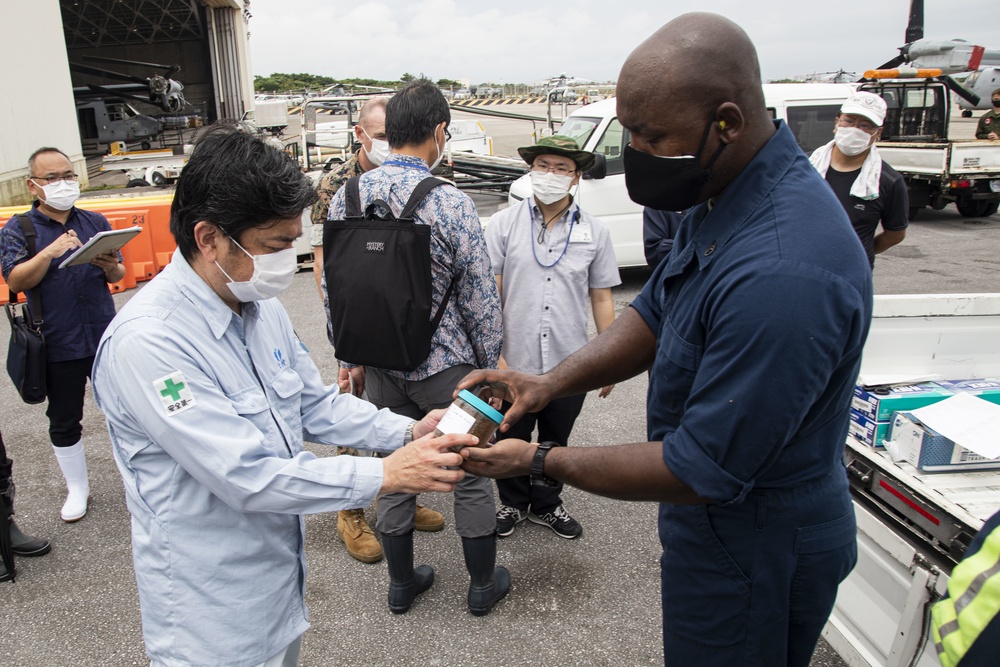 Members of the Okinawan Government Sample Soil on MCAS Futenma