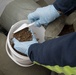 Members of the Okinawan Government Sample Soil on MCAS Futenma