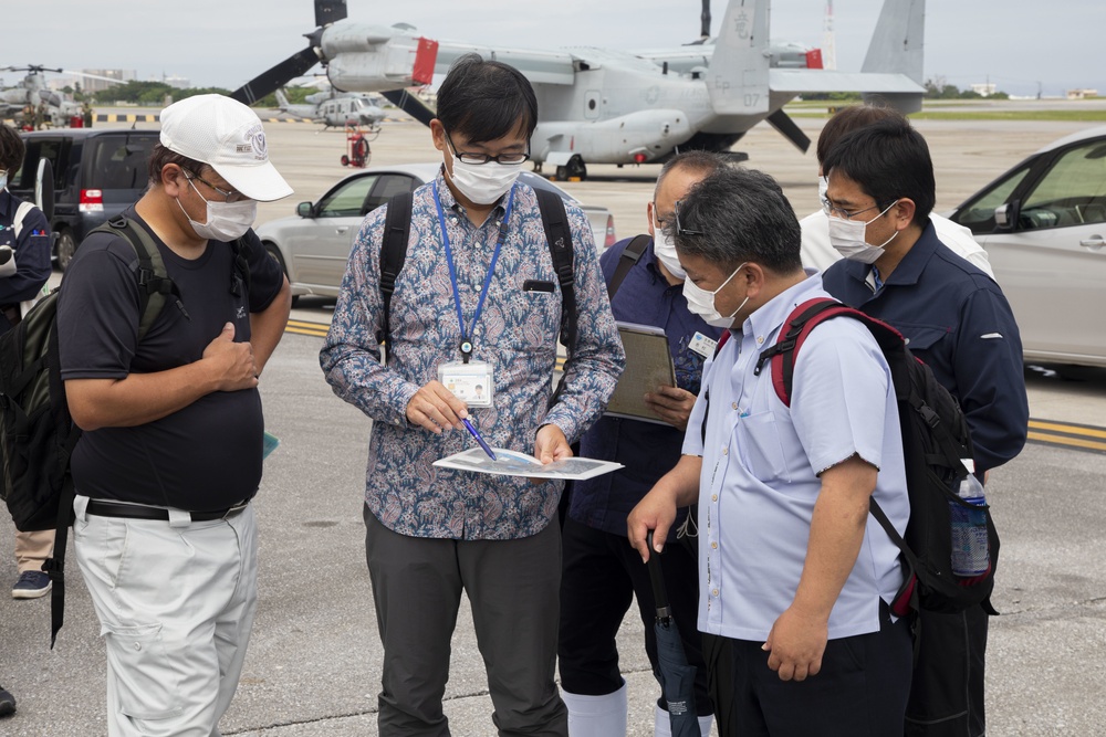 Members of the Okinawan Government Sample Soil on MCAS Futenma