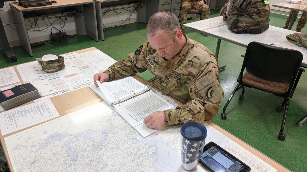 NY Army National Guard helicopter crews conduct water bucket training over Lake Ontario