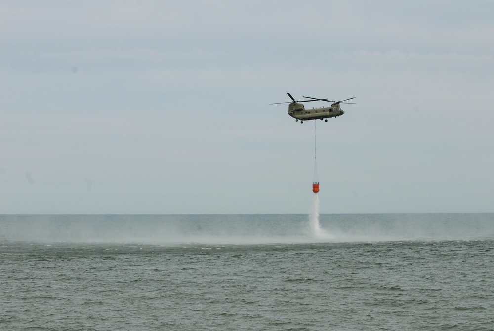 NY Army National Guard helicopter crews conduct water bucket training over Lake Ontario