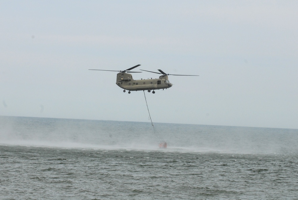 NY Army National Guard helicopter crews conduct water bucket training over Lake Ontario