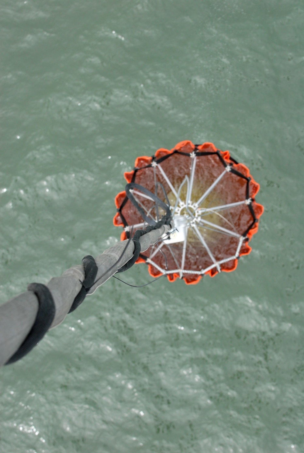 NY Army National Guard helicopter crews conduct water bucket training over Lake Ontario