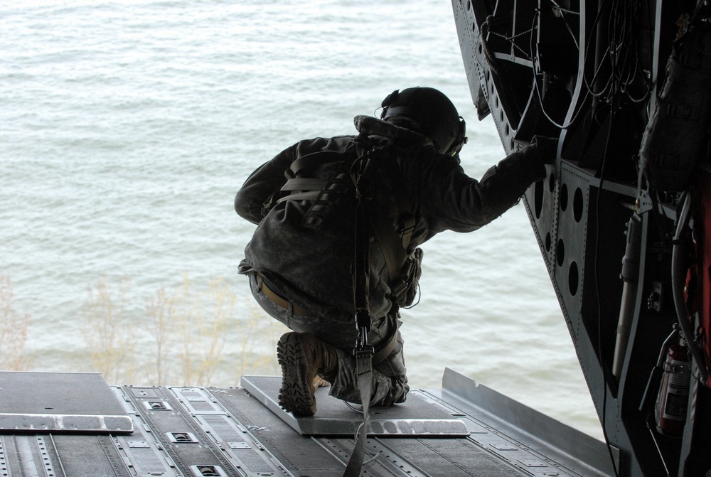 NY Army National Guard helicopter crews conduct water bucket training over Lake Ontario