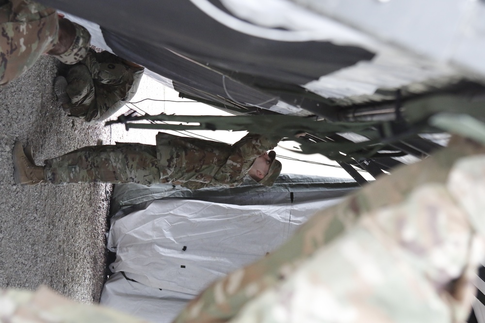 Soldiers inspect tents to prepare for COVID-19 response