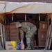 Soldiers load donated groceries