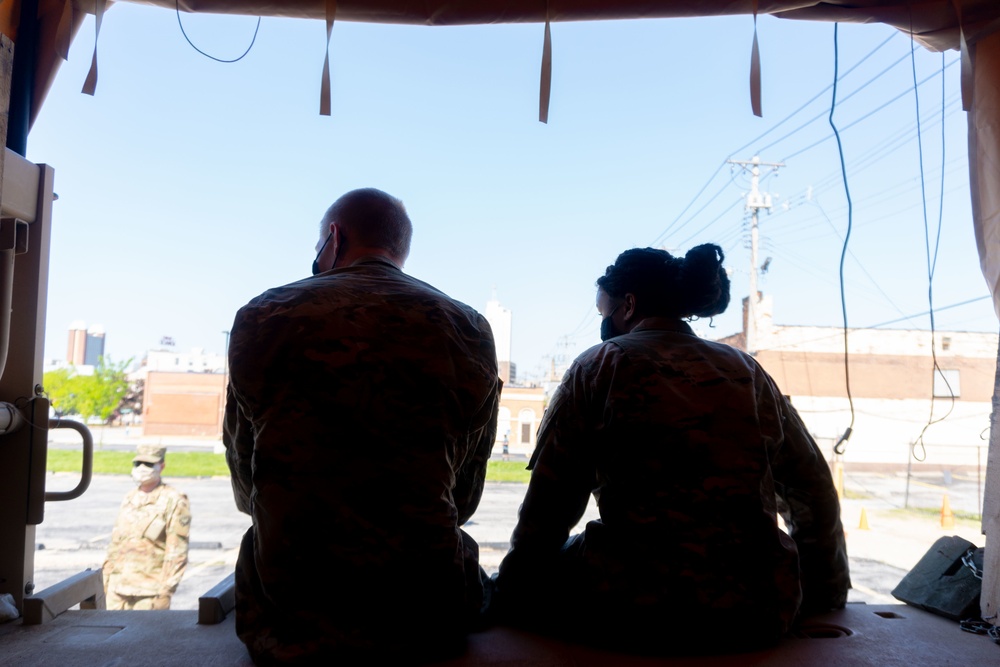 Soldiers load donated groceries