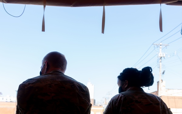 Soldiers load donated groceries