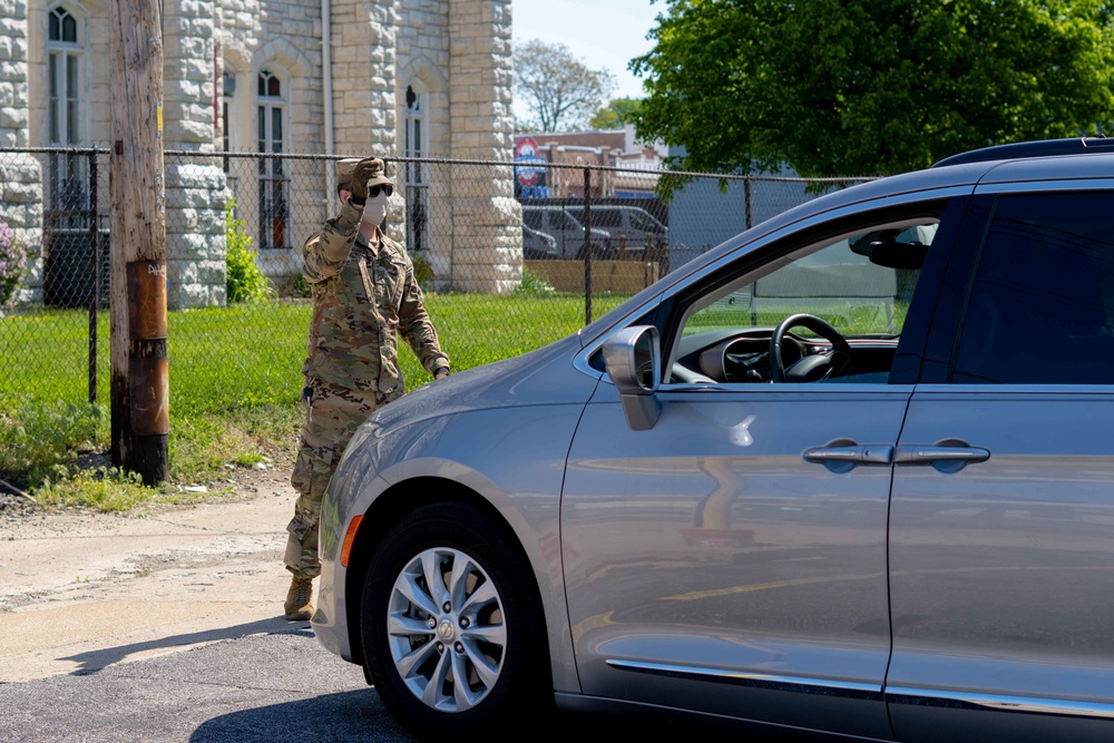 Soldiers load donated groceries