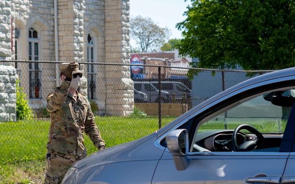 Soldiers load donated groceries