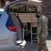 Soldiers load donated groceries
