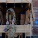 Soldiers load donated groceries