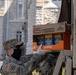 Soldiers load donated groceries