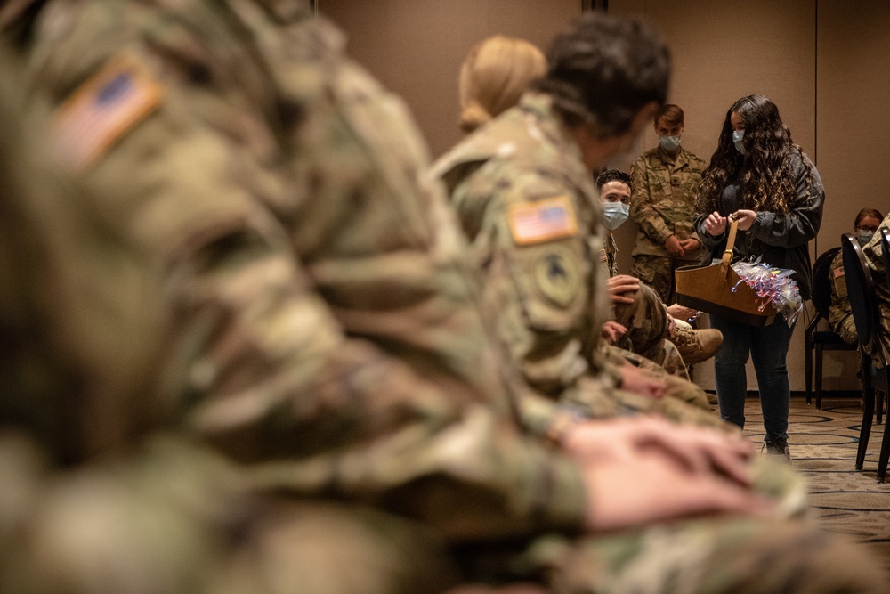 Sophia Farid hands out masks she made for military personnel