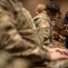 Sophia Farid hands out masks she made for military personnel
