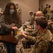 Sophia Farid hands out masks she made for military personnel