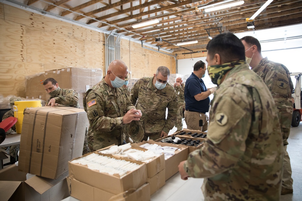 Delaware National Guard assemble care packages for COVID-19 testing sites