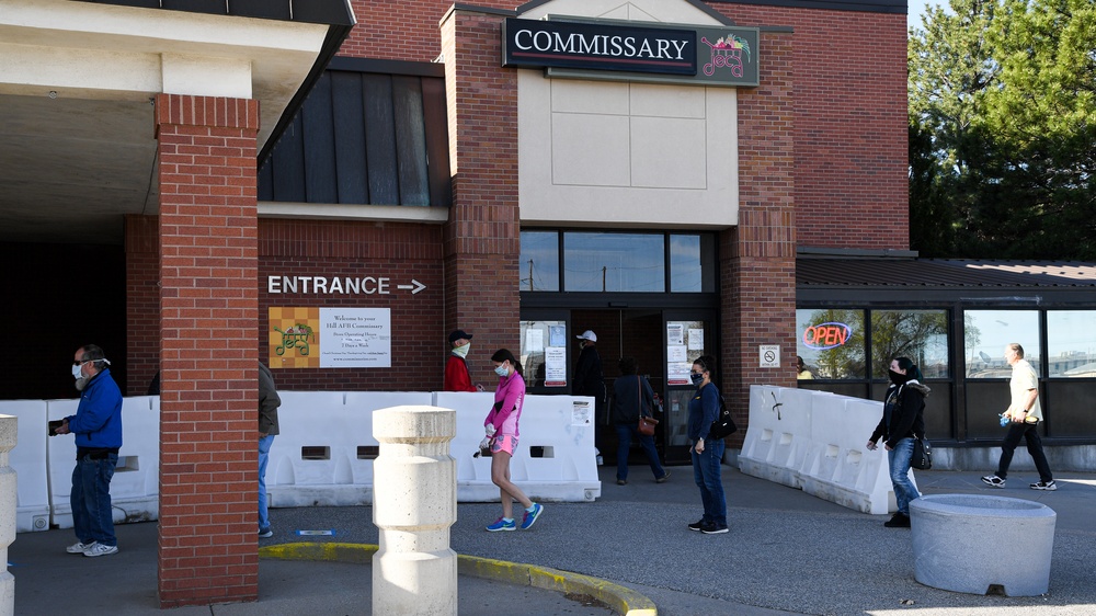 Commissary patrons line up before opening