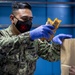 USNS Mercy Sailor Works in the Ship’s Store