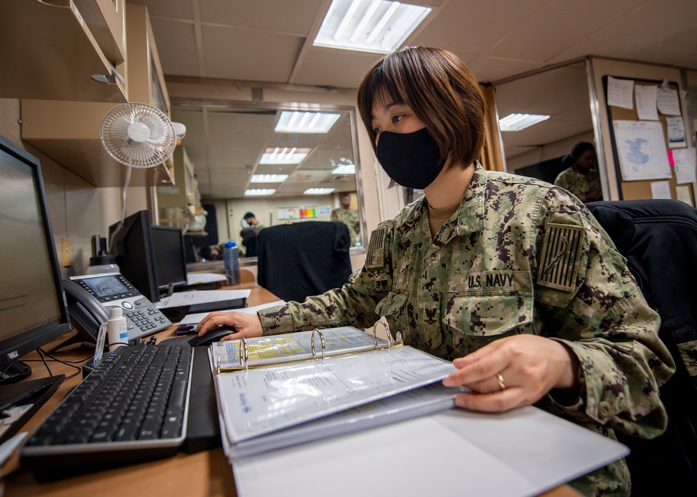 USNS Mercy Sailor Works in the Supply Office