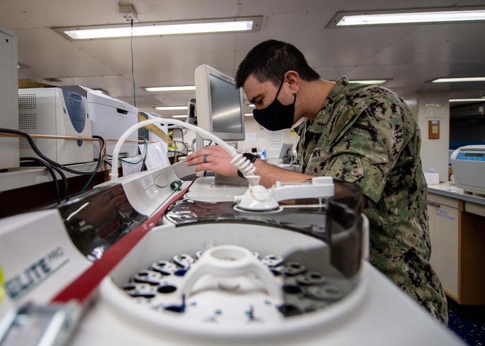 USNS Mercy Sailor Troubleshoots Medical Equipment