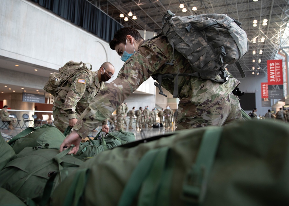 Soldiers from the 531st Hospital Center depart New York